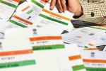 aadhar card for indian living abroad, is it illegal for nri to have aadhar card, india budget 2019 aadhar card under 180 days for nris on arrival, India budget