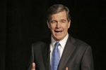 Elaine Marsha
Focus: Roy Cooper, North Carolina Military, roy cooper honors north carolina military members, Botswana