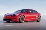 Tesla new electric car breaking updates, Tesla new electric car launch, tesla to launch electric hatchback without a steering wheel, Tesla car